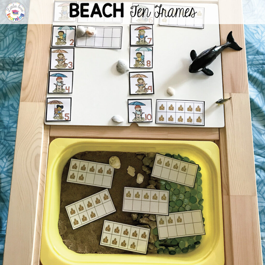 Preschool beach sensory bin with summer-themed ten frame cards for math activity.