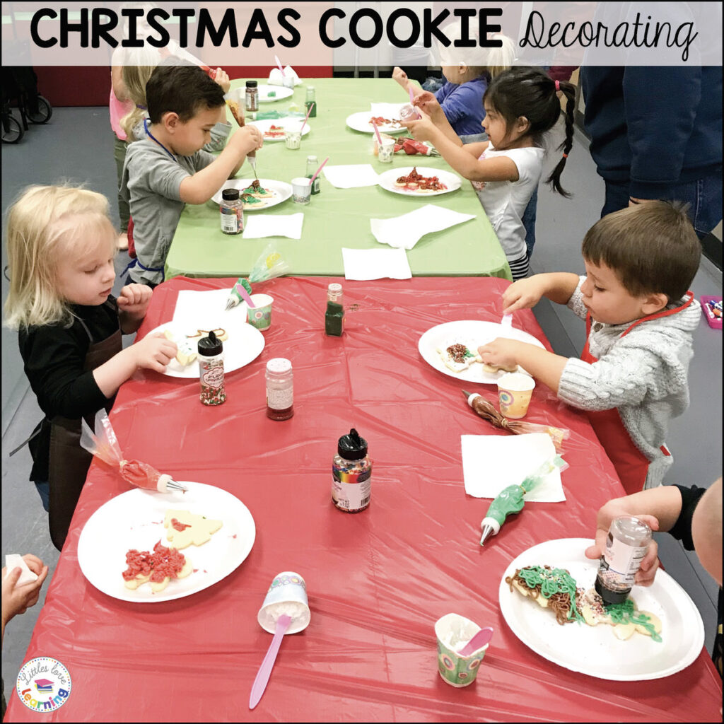 Preschoolers decorating Christmas cookies 